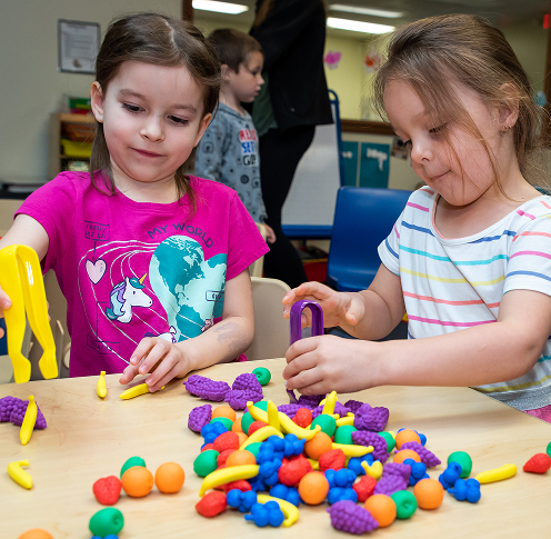 Our Mission Kids Playing with Fruit Toys