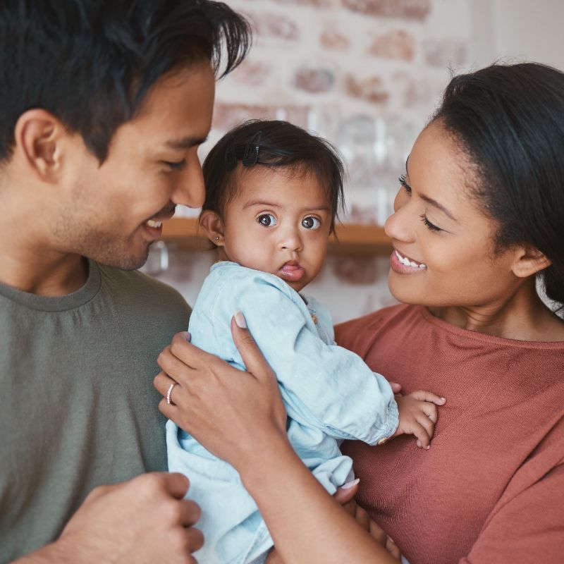 two parents with baby