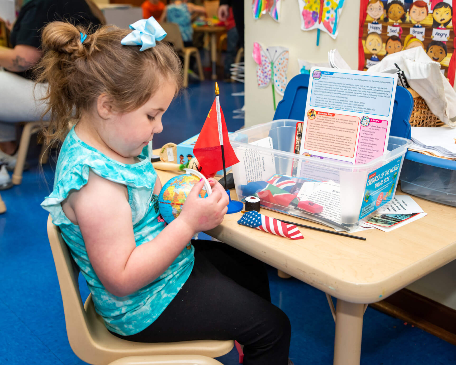 preschool-girl-playing-with-toys