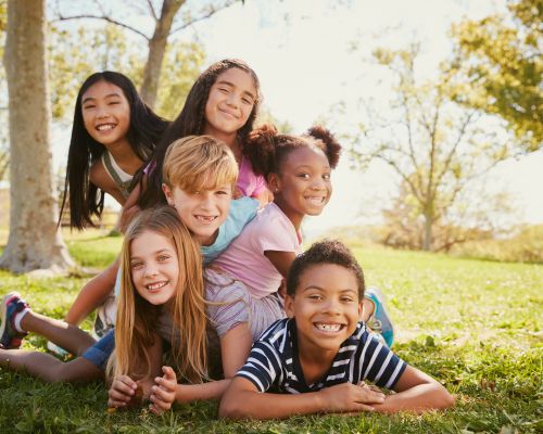 Summer camp kids playing outside